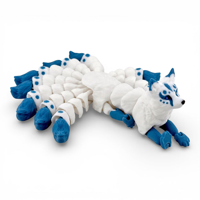 Kitsune Fox figurine side profile showing segmented tails