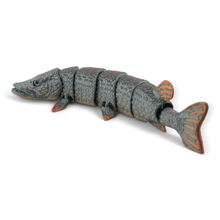 Close-up of Northern Pike figurine mottled markings and glass eye