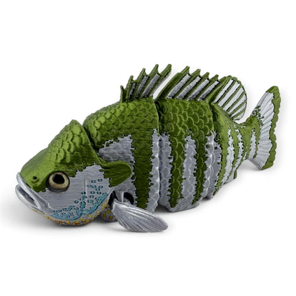 Close-up of Bluegill figurine glass eye and banded coloring detail