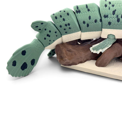 Close-up of Alligator Gar figurine snout and glass eye detail