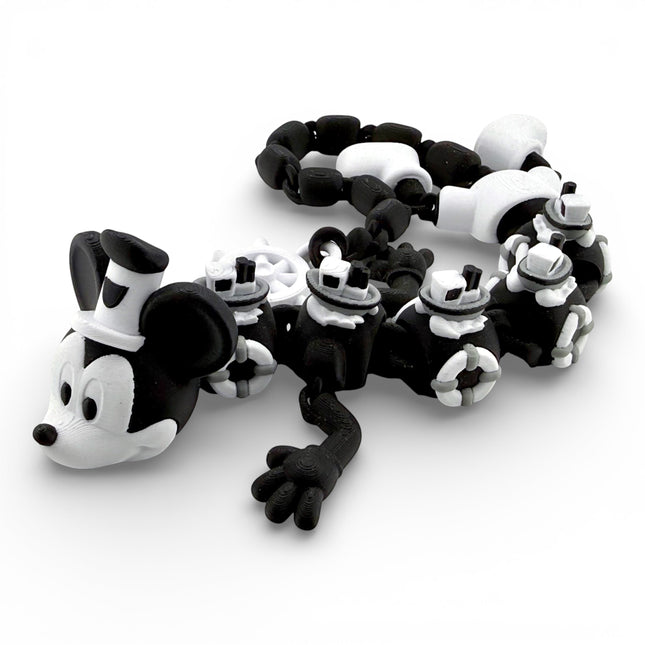 Steamboat Willie Dragon figurine side profile showing black and white scheme