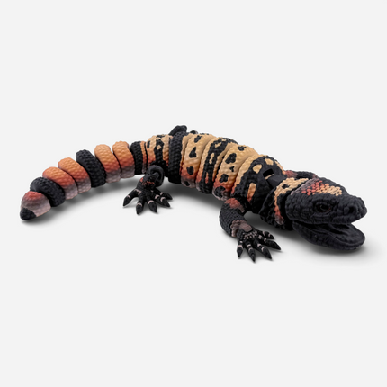 Gila Monster figurine side profile showing brick pattern