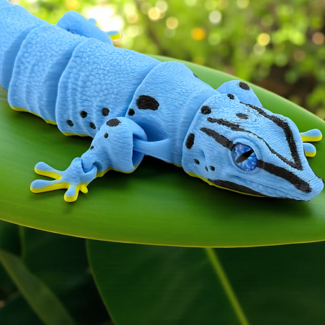 3D Printed Flexi Giant Day Gecko with Realistic Glass Eyes – Gunmetal Blue with Black Head and Front Leg Markings