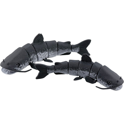 Tidal 3D Printed articulated catfish figures in black and grey with detailed whiskers and flexible segments.
