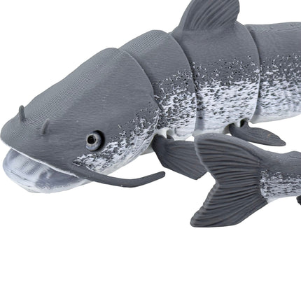 Tidal 3D Printed articulated catfish toy with grey mottled finish, realistic barbels, and detailed fins.